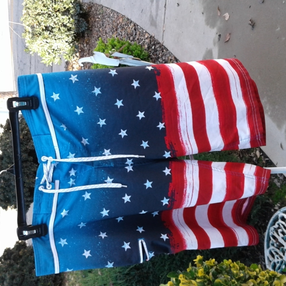 Men swim trunks size 34 no rips or stains red white and blue like the flag